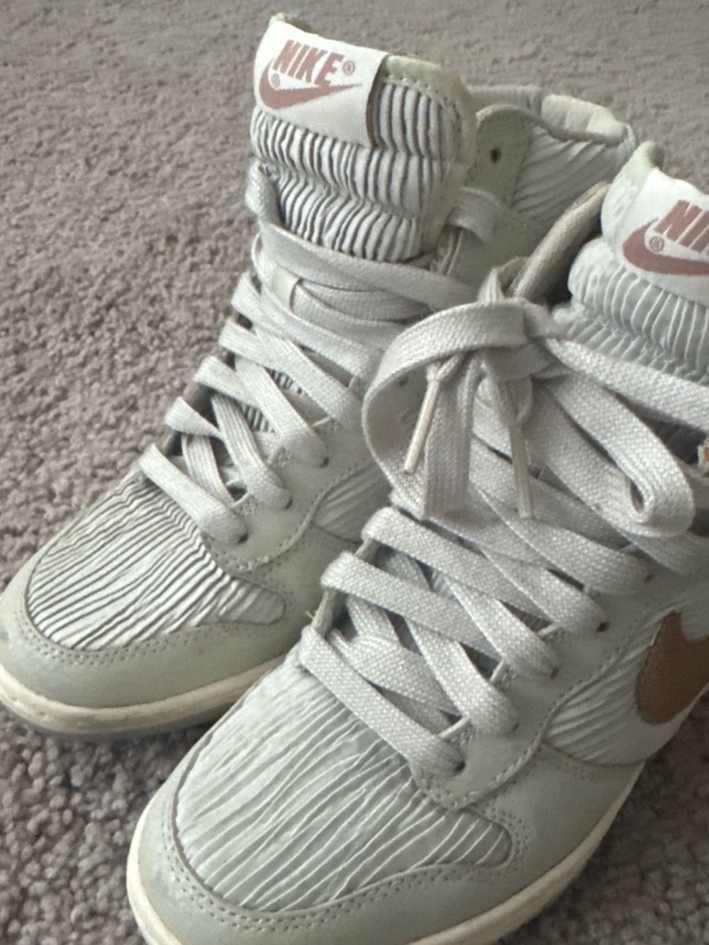 Nike Women’s High-Top Sneakers in Light Gray with Metallic Rose Swoosh